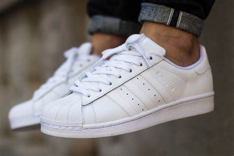 high top adidas shell toes